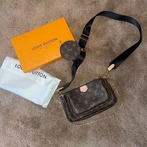 Multi way Pochette Monogram Canvas